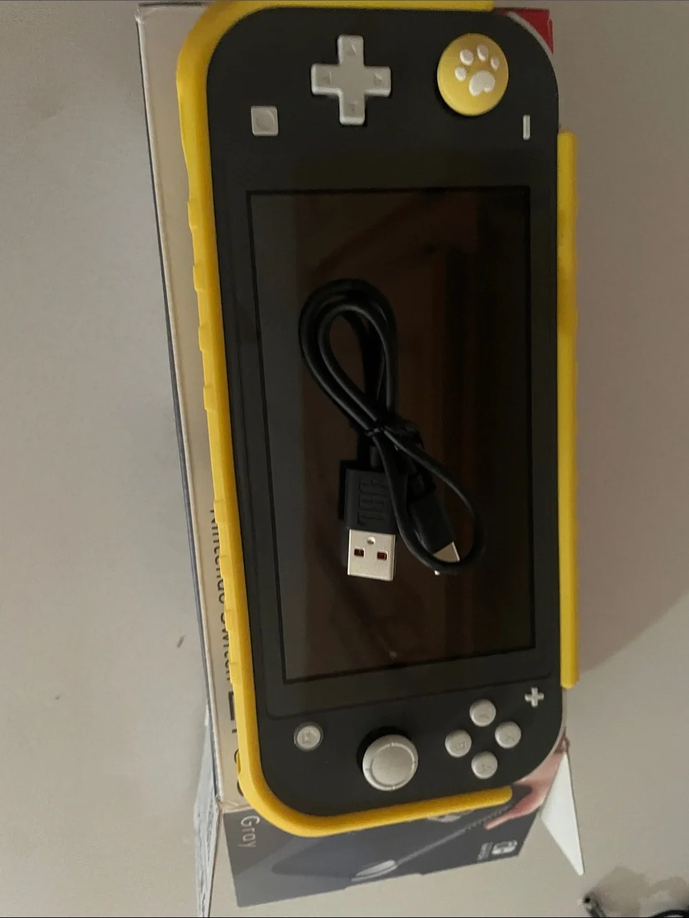 Nintendo Switch Lite Gray with Yellow Case with game